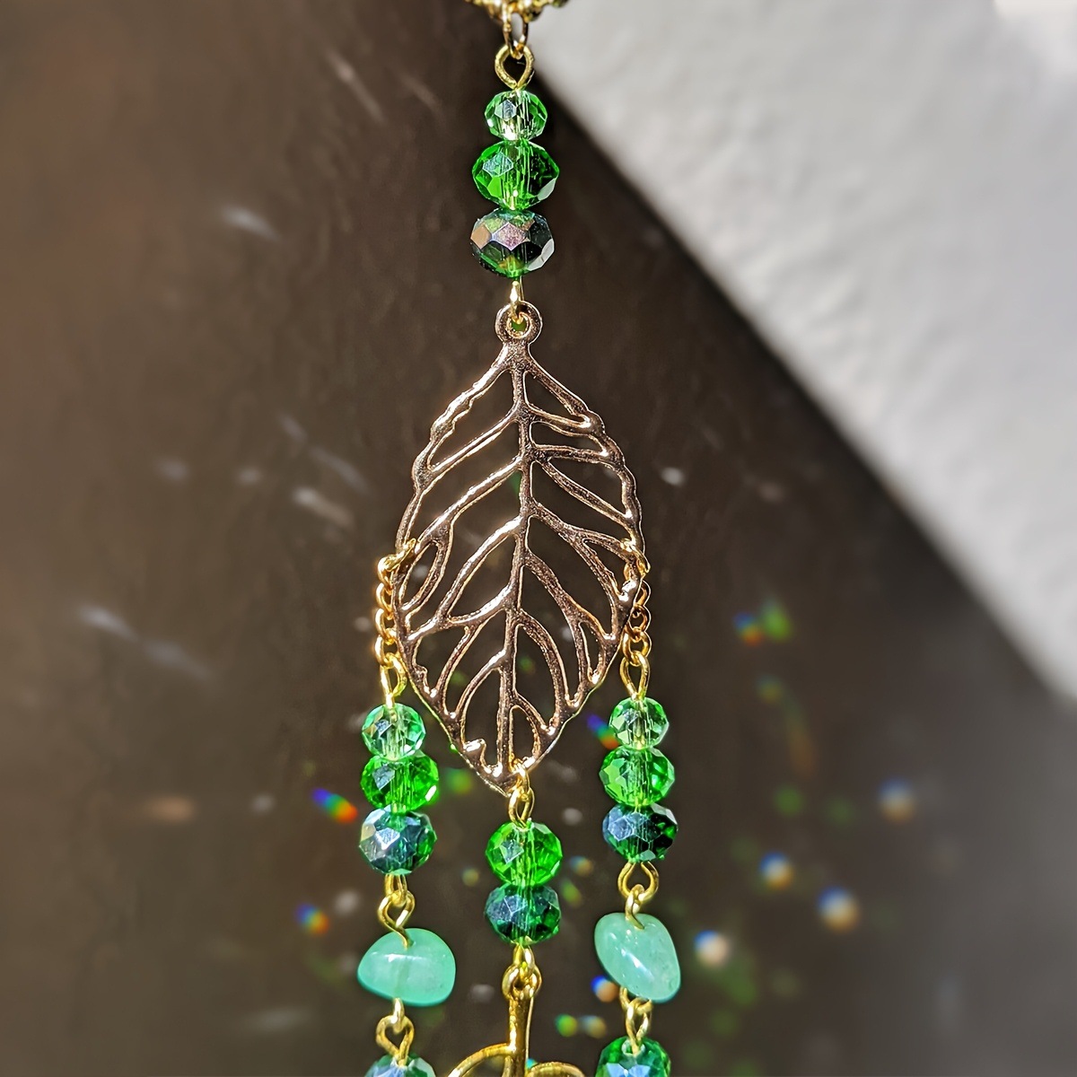 Green Crystal Suncatcher Hangi - مراجعة Crystal Ball Decor وسعره